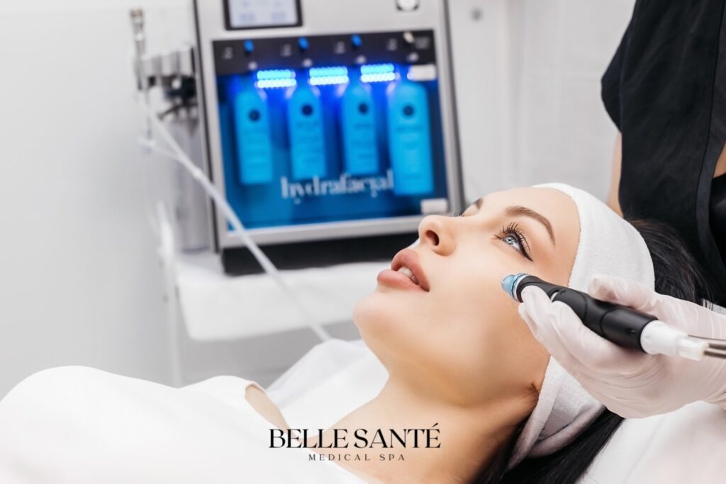 Young woman receiving a hydrafacial on her face